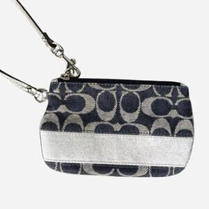 Coach branded silver wristlet wallet